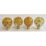 Four resin orbs, each 18cmH