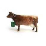 A Beswick Dairy Shorthorn Cow ''Ch. Eaton Wild Eyes 91st'', model No. 1510, with label, 12cmH