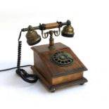 A reproduction rotary dial telephone