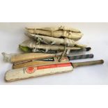 Three cricket bats, one by Gray Nicholls, one signed by the Gloucestershire and Northamptonshire