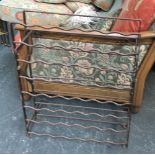 A wrought iron wine bottle rack, 58x73cmH