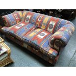 A Chesterfield style sofa in kilim style fabric, feather filled cushions, 195cmW