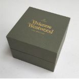 A Vivienne Westwood Time Machine watch, the dial 2.5cmD, boxed with papers