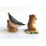 A Beswick Beatrix Potter Timmy Willie figurine, 7cmH; together with a Nuthatch, no. 2413, 7.5cmH