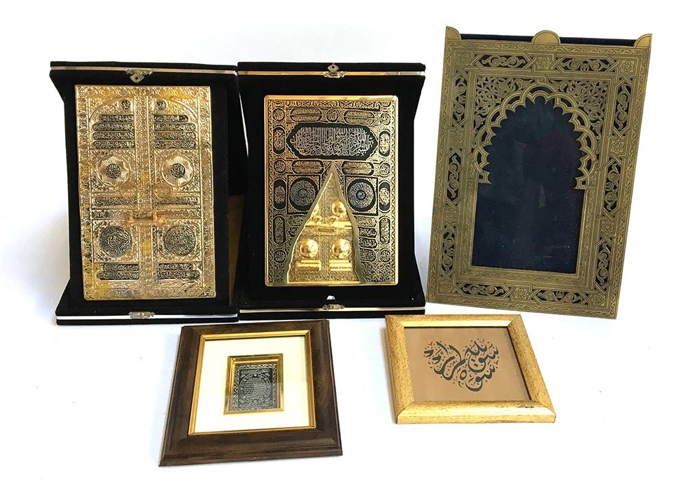 Two decorative reliefs of mosque door, within velvet case; together with a pierced brass Islamic