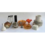 A mixed lot to include a tiger teapot, a silvered teapot, orange lustre glassware, black vase,