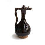 A 19th century Turkish Ottoman Kanakkale pottery ewer (af), 37cm high