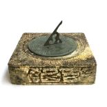 A sundial on composite stone base, 30cm2