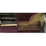 A rush duster; together with a small book rack, 46cmW