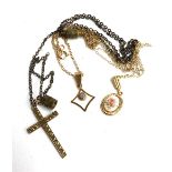 A 9ct gold cross on a metal chain, small 9ct gold pendant set with a small diamond on a 9ct chain