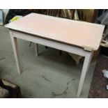 A vintage 'formica' style pine kitchen table, 61x106x76cm