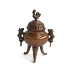 A Japanese twin handled copper censer with cockerel finial, on tripod base, 18cmH