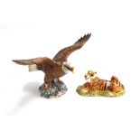 A Beswick figure of a bald eagle, no. 1018, marked to base, 19.5cmH; together with a Royal