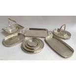 A quantity of silver plated trays, platters, swing handled basket etc