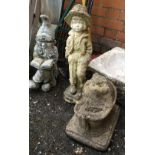 A composite stone garden gnome, hedgehog, and boy, the boy 55cmH