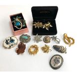 Fourteen brooches to include one set with Turquoise, another marcasite and others