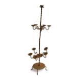 A wrought iron floor standing candle holder, 11 candles, approx. 108cmH