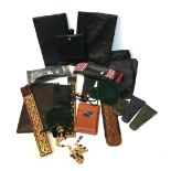 A designer wash bag; mobile phone case; folding glasses; black leather phone case; magnifiing