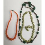 Three bead necklaces, one jade, another olive green agate with a gold clasp and a further set of
