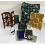A mixed lot to include enamel photo frames; together with various others; several items of glassware