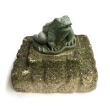 A composite stone frog water feature, on plinth approx. 33cm2