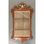 A mahogany and gilt ho-ho mirror, 88cmH
