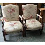 A pair of Gainsborough upholstered open armchairs, with serpentine fronted seats