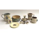 A collection of 10 pieces of Poole pottery, three pieces with Carter, Stabler Adams stamp, to