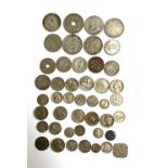 A quantity of silver and other coins, to include 1896 Zuid Afrik Repub 2 shilling coin; 1942 British