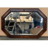 An Edwardian octagonal oak framed mirror, with bevelled glass and bobble moulding, 60x90cm