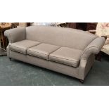 A brown upholstered three seater sofa, 235cmW
