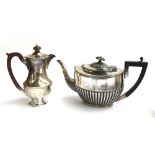 A silver coffee pot by Henry Clifford Davis, Birmingham 1931, 19cmH, 12.5oz; together with a