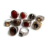 Ten 925 silver rings with various brown/orange stones, gross weight 147g