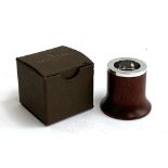 A Patek Philippe maple wood loupe, boxed, RRP £249