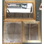 A modern gilt framed mirror, with rope twist detail and bevelled glass, 97x66cm; together with two