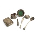 A small mixed lot of silver to include cigarette case, napkin ring, compote spoon, small picture