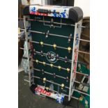 A table football table, the legs in need of replacement/repair