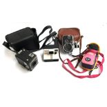 A mixed lot of photographic equipment, to include Polaroid Land Camera supercolor 1000; Six-20 Kodak