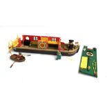 A Sylvanian Families canal barge, with three animal figures