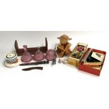 A mixed lot to include a set of three pink glass dressing table bottles; wooden windmill (af);