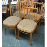 A set of four mid century Schreiber beechwood chairs, together with a matching circular table,