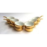 A set of 12 Royal Worcester gilt fireproof ramekins