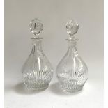 A pair of cut crystal decanters, each 29cmH