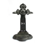 A cast iron Coalbrookdale style stick stand with drip tray, 64cmH