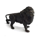 A bronze figure of a lion, approx. 13.5cmH