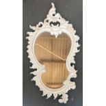 A decorative French wall mirror, the shaped bevelled plate within acanthus scrolling frame, 110cmH