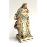An early 19th century Staffordshire pearlware depicting 'Charity', on square base, 18.5cmH