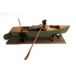 A scratch built scale model rowing boat, with remote control, 57cmL, with scale drawings