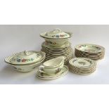 A Portland Pottery Cobridge part dinner service, to include plates, tureens etc; Together with