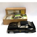 A Vauxhall Firenza Mardave 1/8 scale model car kit for 2 channel radio control, with instructions,